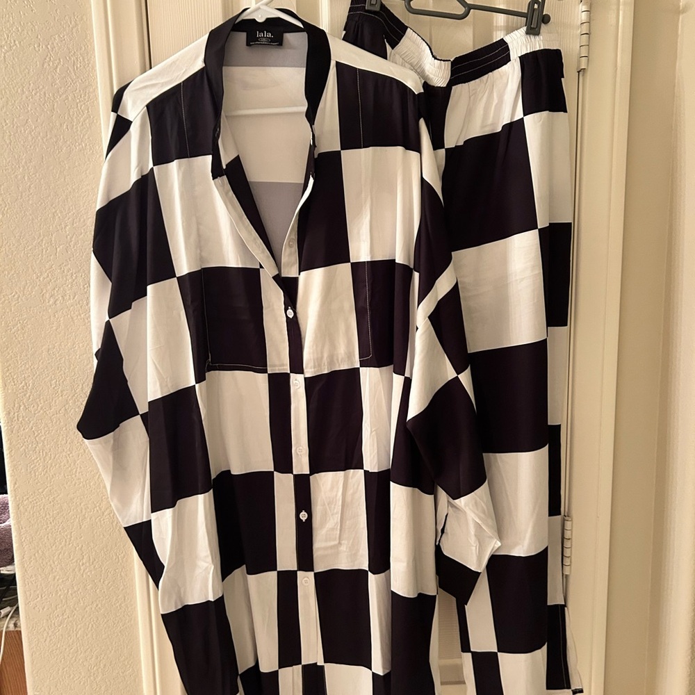 Dressed in LALA Black and White Checkered pants set.
